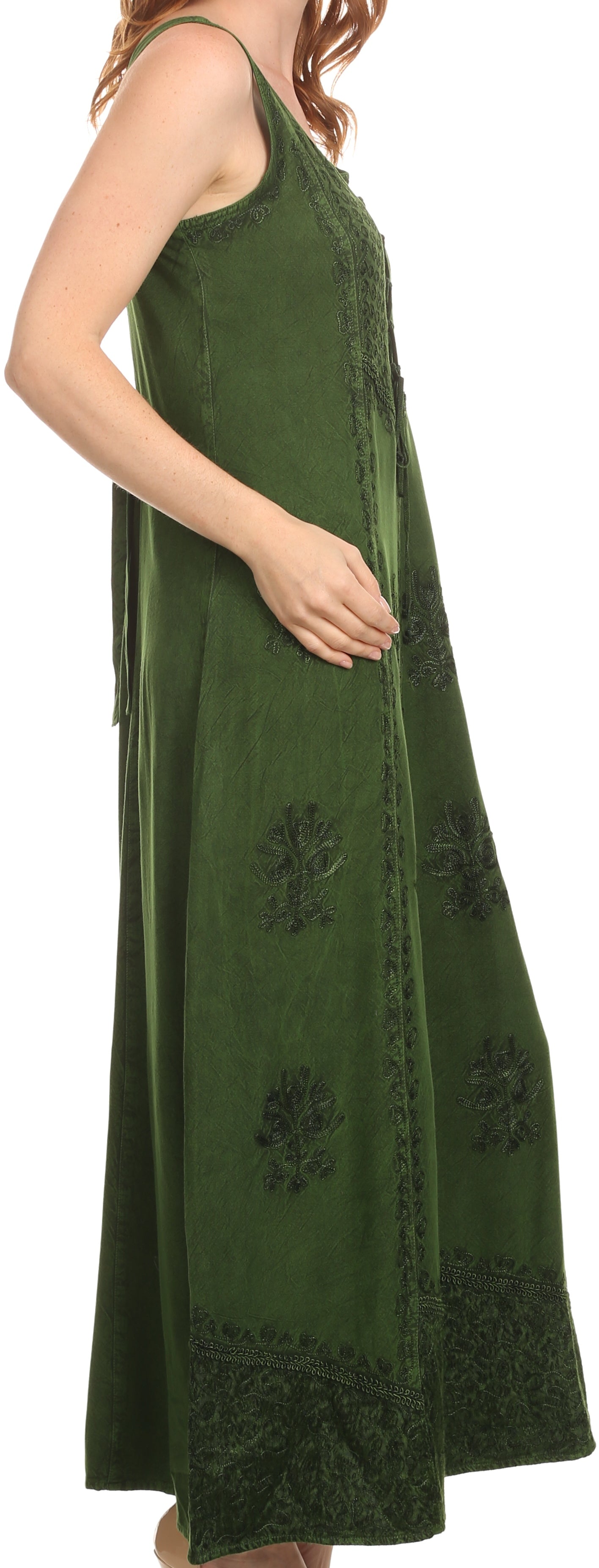 Green dress with floral embroidery on a white background