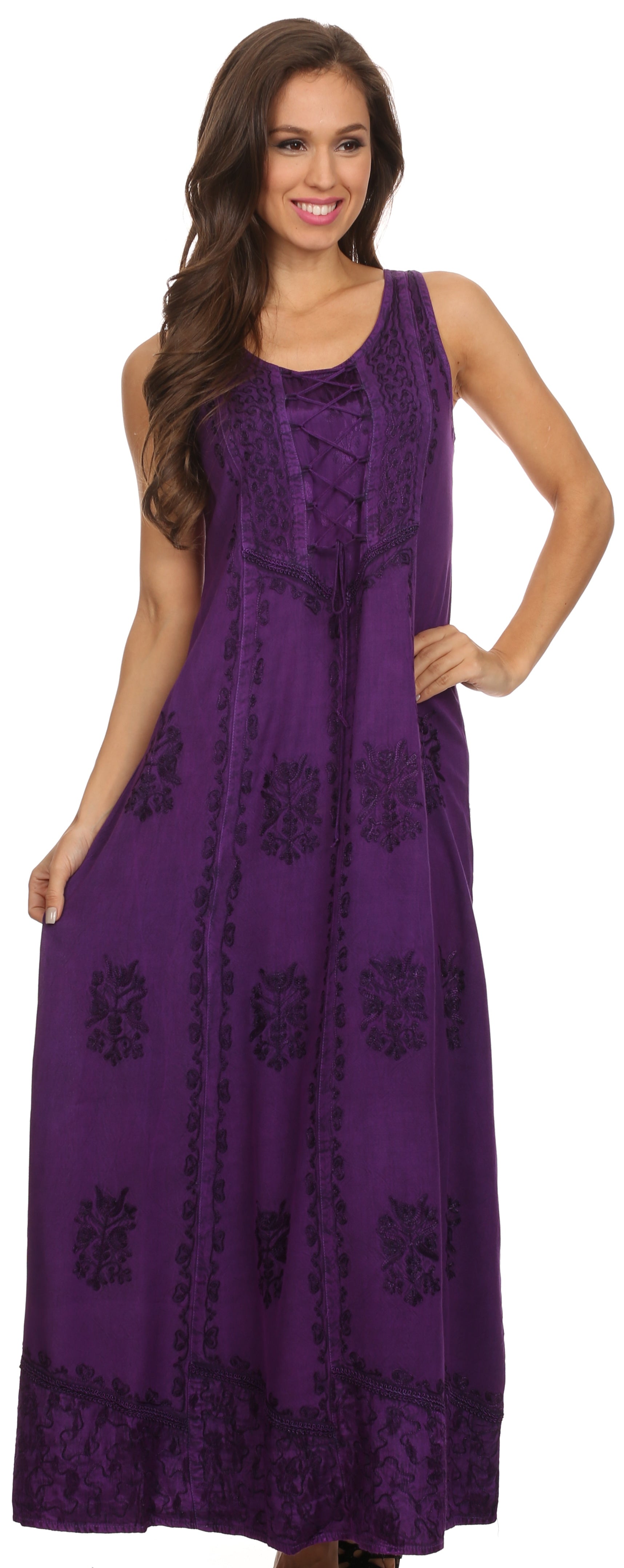 Woman wearing a purple floral dress on a white background