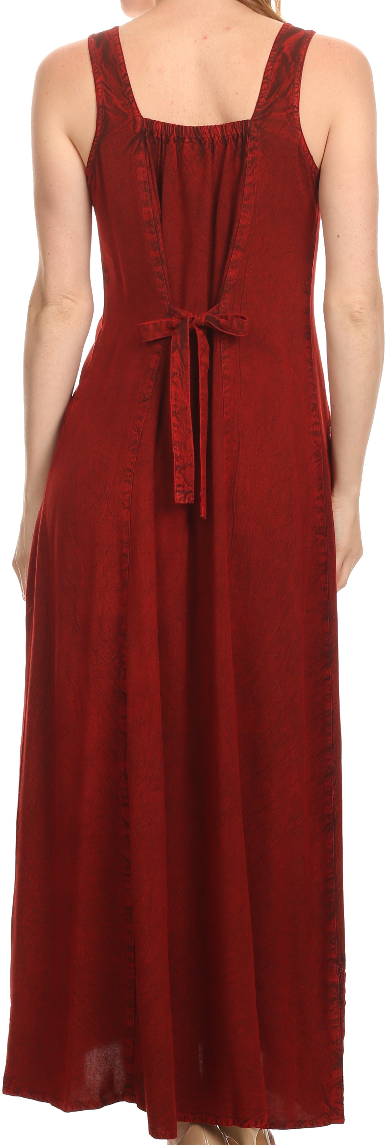 Red sleeveless dress with a belt on a plain background