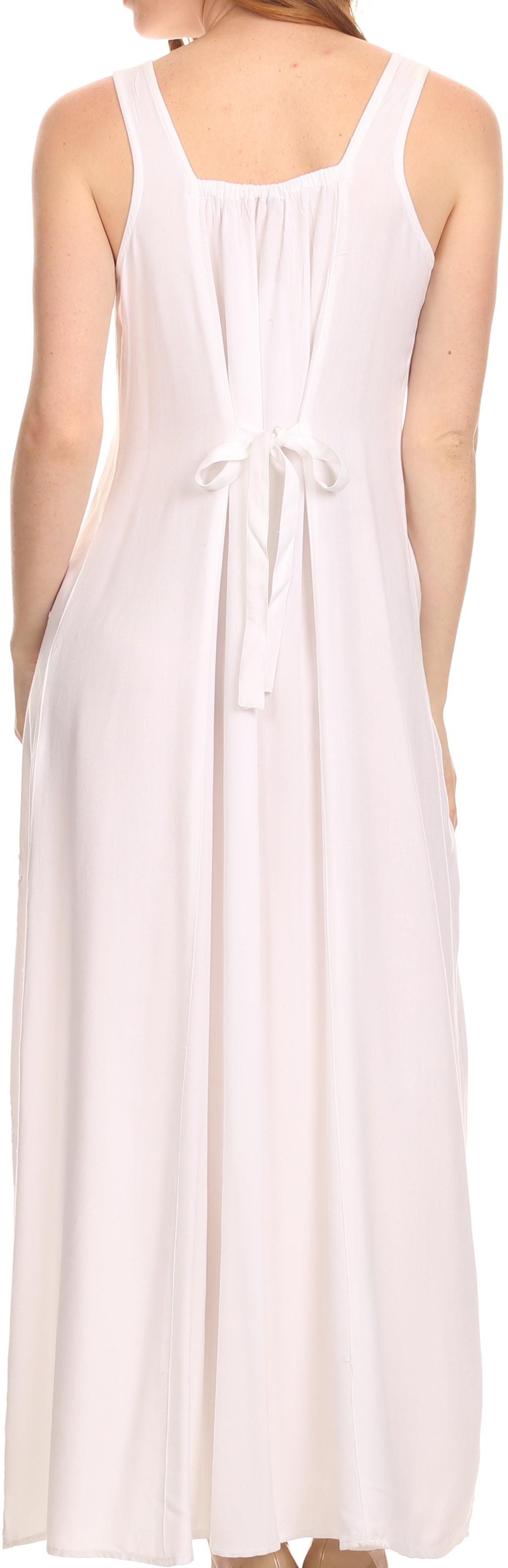 White sleeveless dress worn by a person