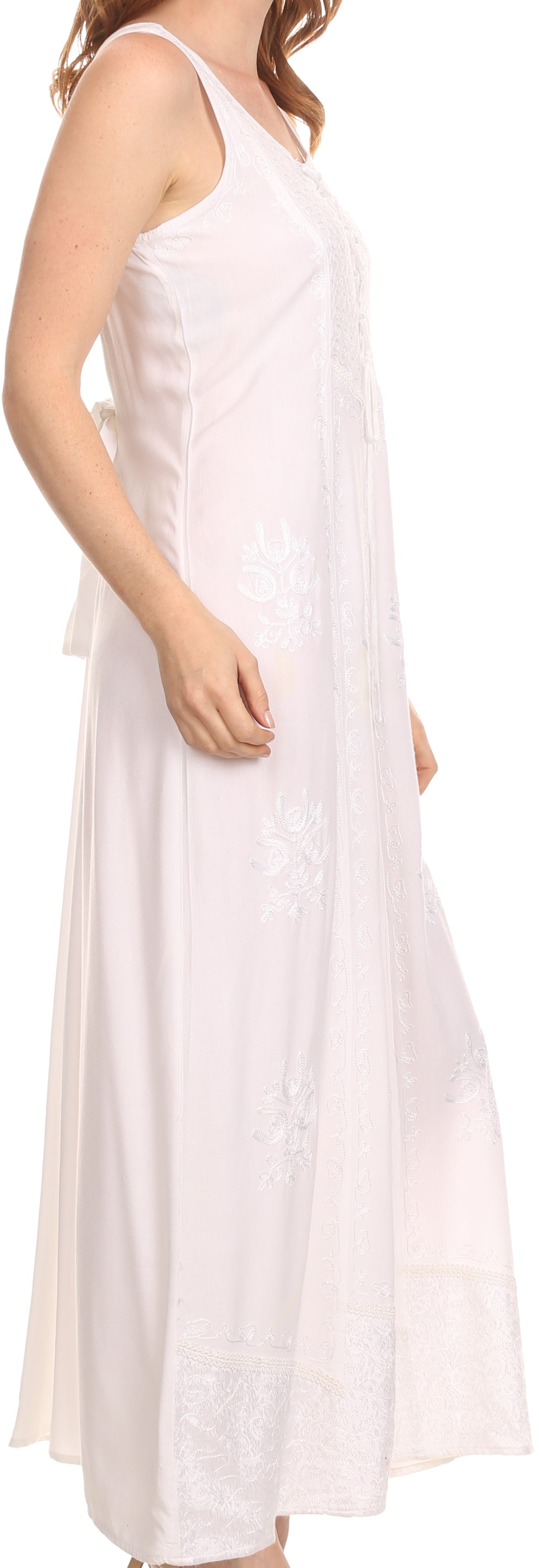 White sleeveless dress worn by a model on a white background