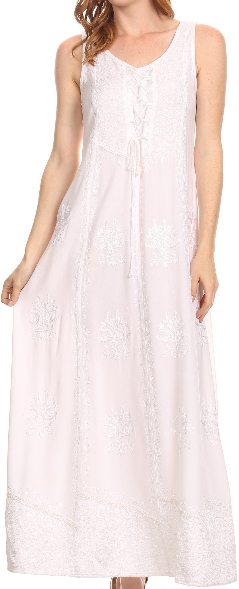 Woman wearing a white sleeveless dress against a neutral background