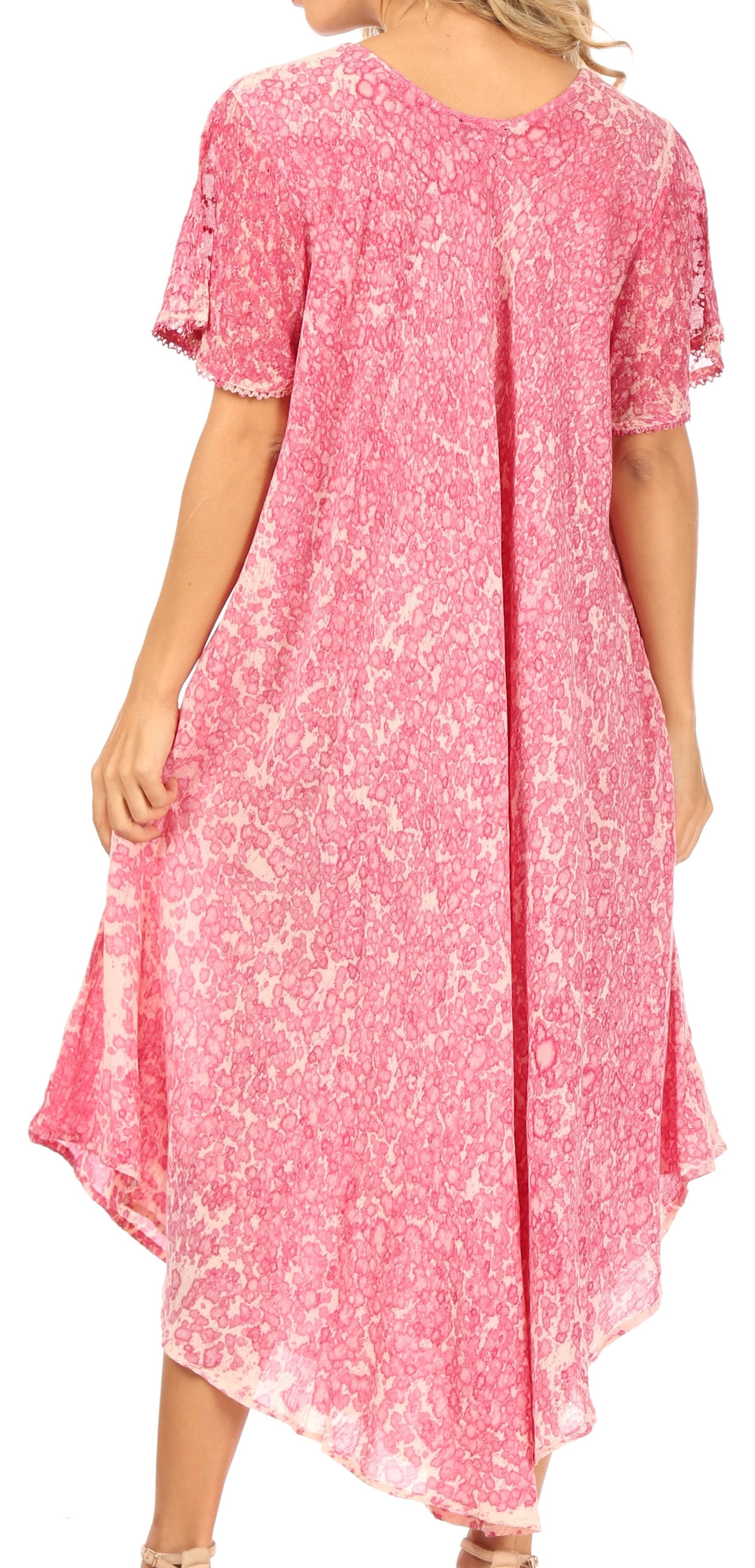 Woman wearing a pink floral dress on a white background