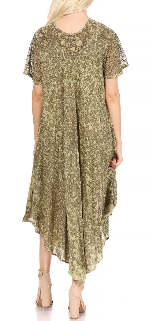 Woman wearing a green patterned dress on a white background