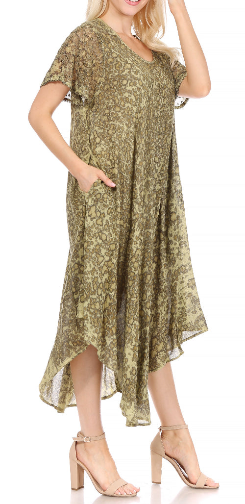 Woman wearing a green floral dress on a white background