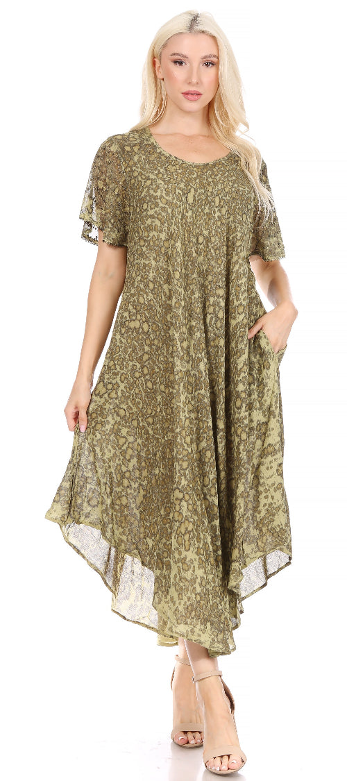 Woman wearing a green floral dress on a white background