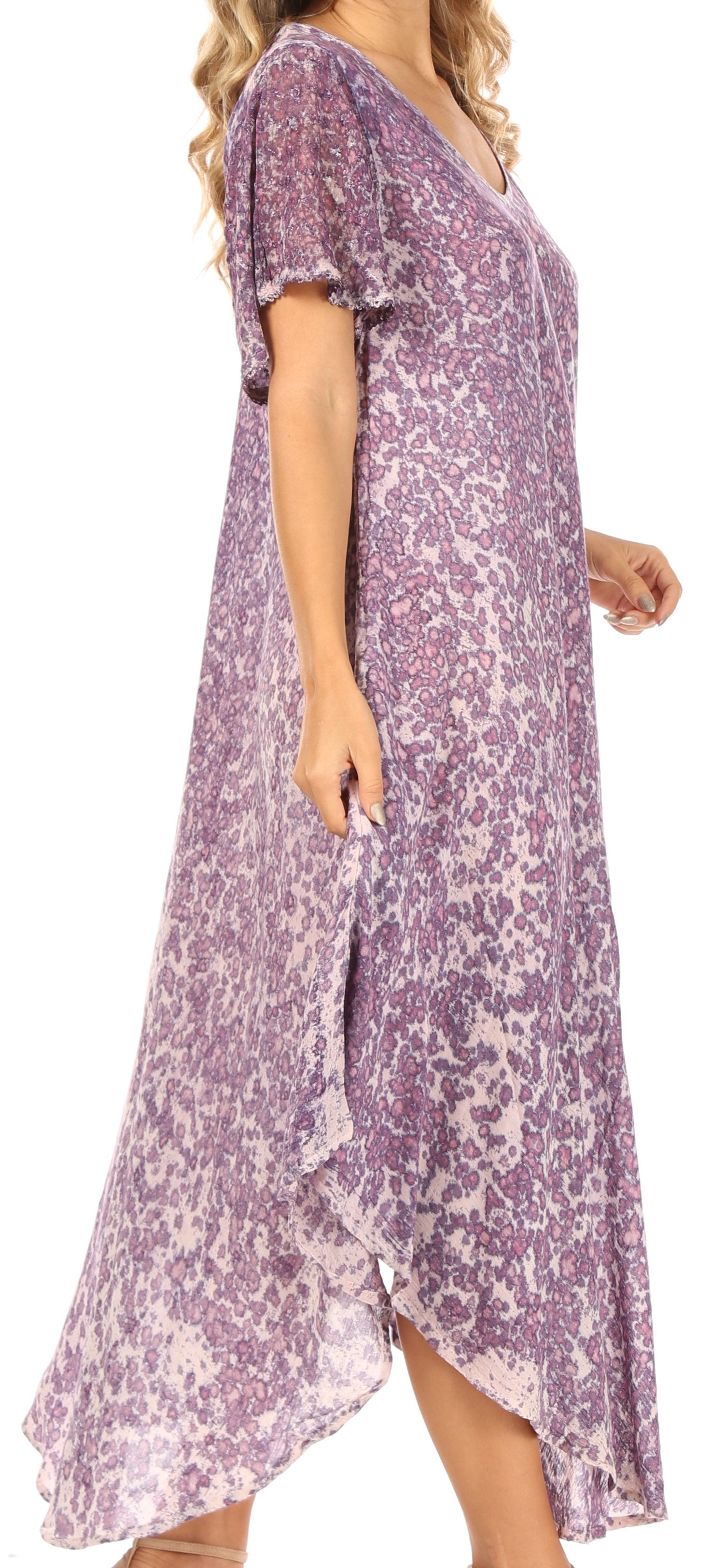 Purple floral dress worn by a model on a white background
