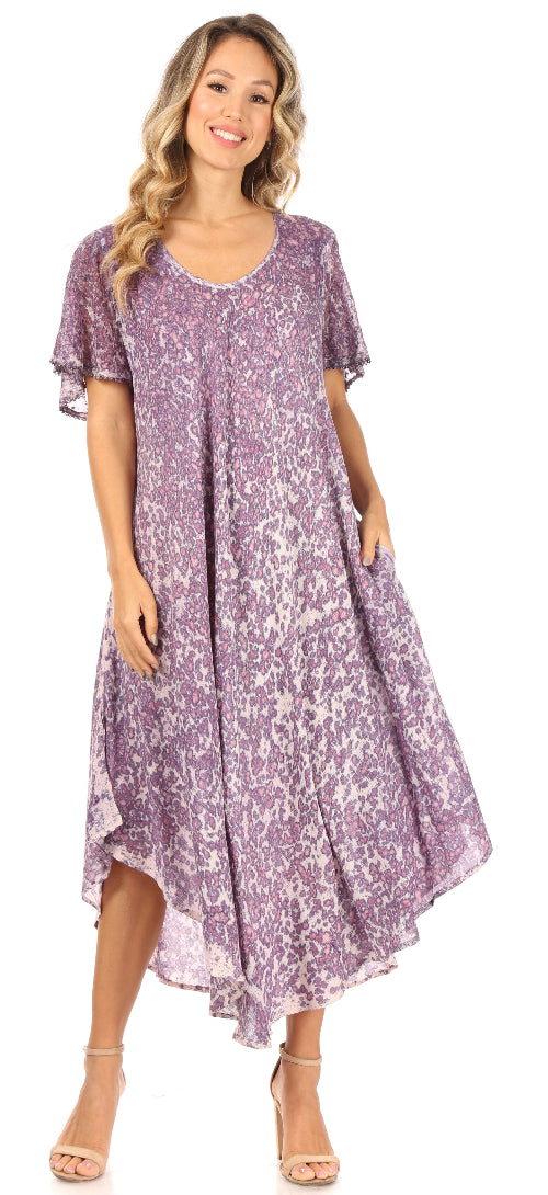 Woman wearing a purple floral dress on a white background