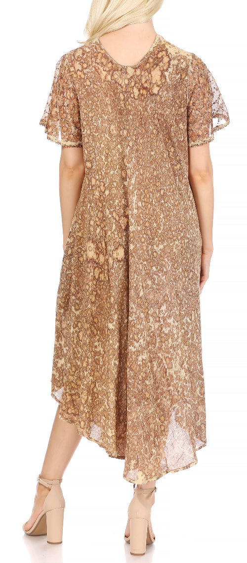 Woman wearing a floral dress with a plain background