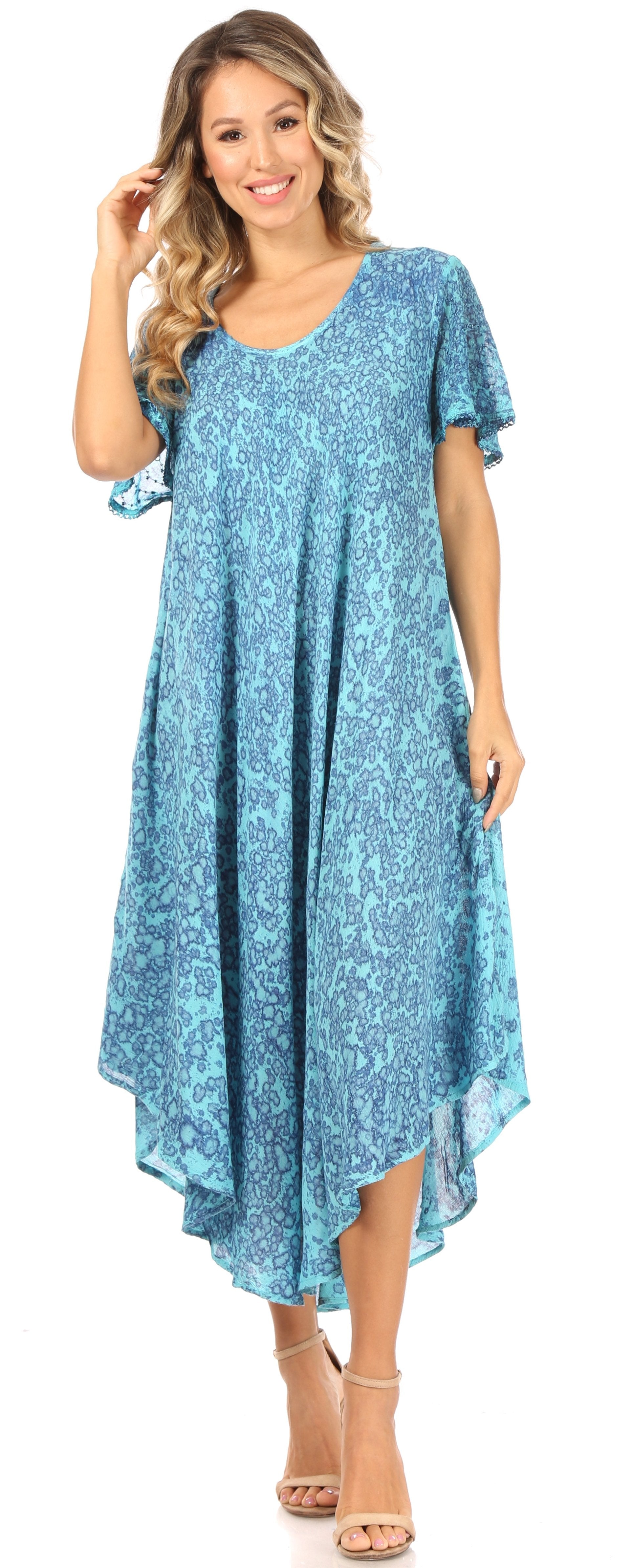 Woman wearing a blue floral dress on a white background
