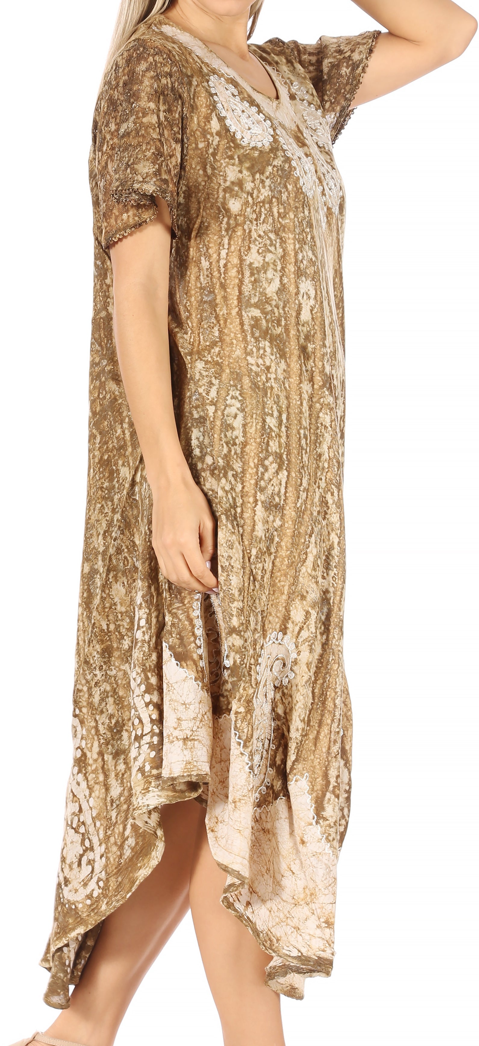 Woman wearing a patterned dress on a white background