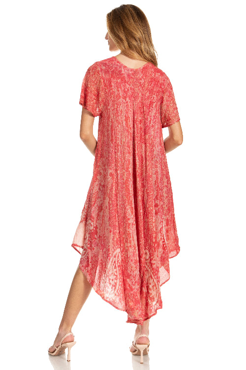 Woman wearing a red patterned dress on a white background
