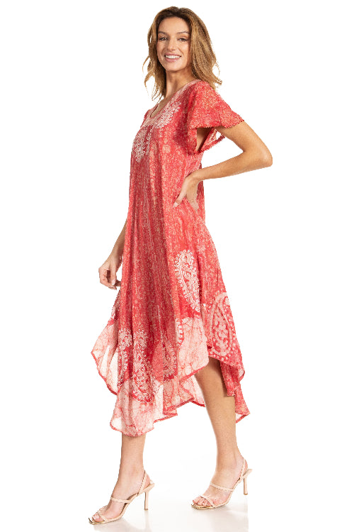 Woman wearing a red floral dress on a white background