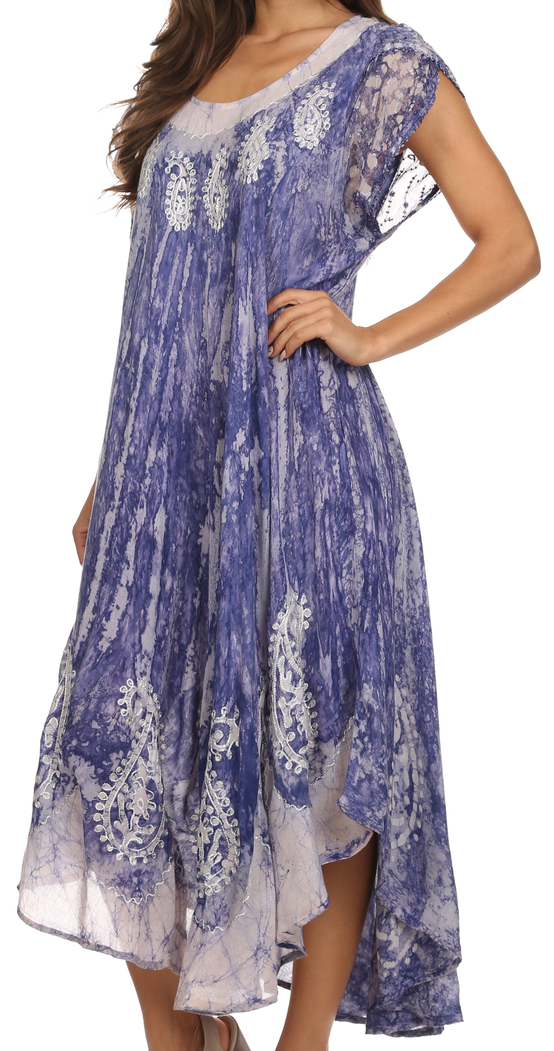 Woman wearing a blue and white patterned dress on a white background