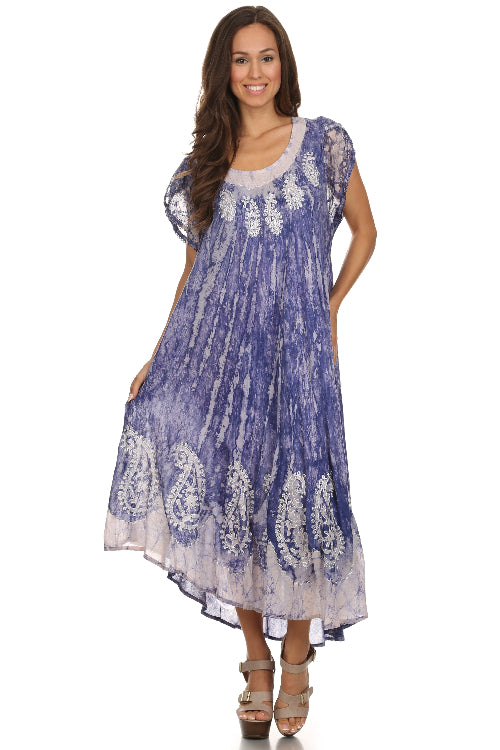 Woman wearing a blue and white patterned dress on a white background