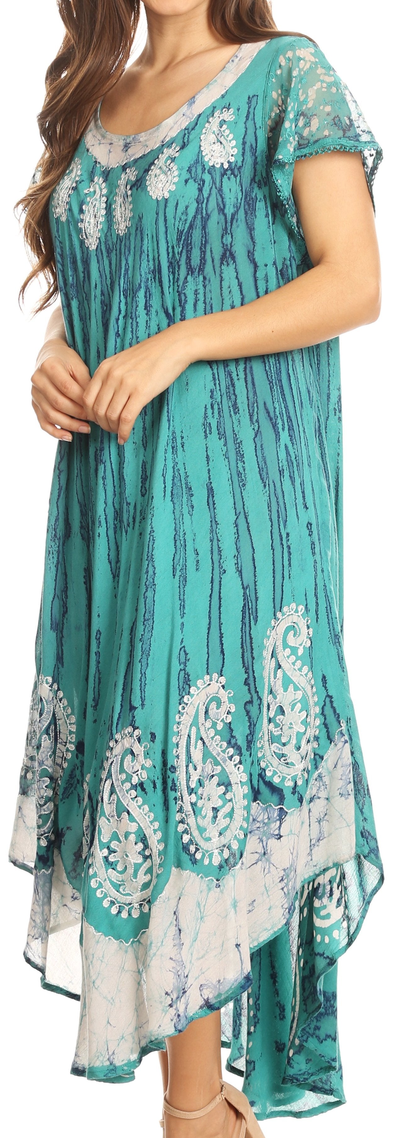 Teal dress with white paisley patterns on a person
