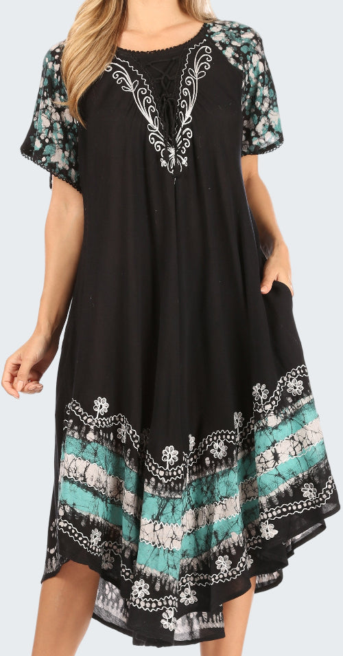 Black dress with floral patterns on a white background