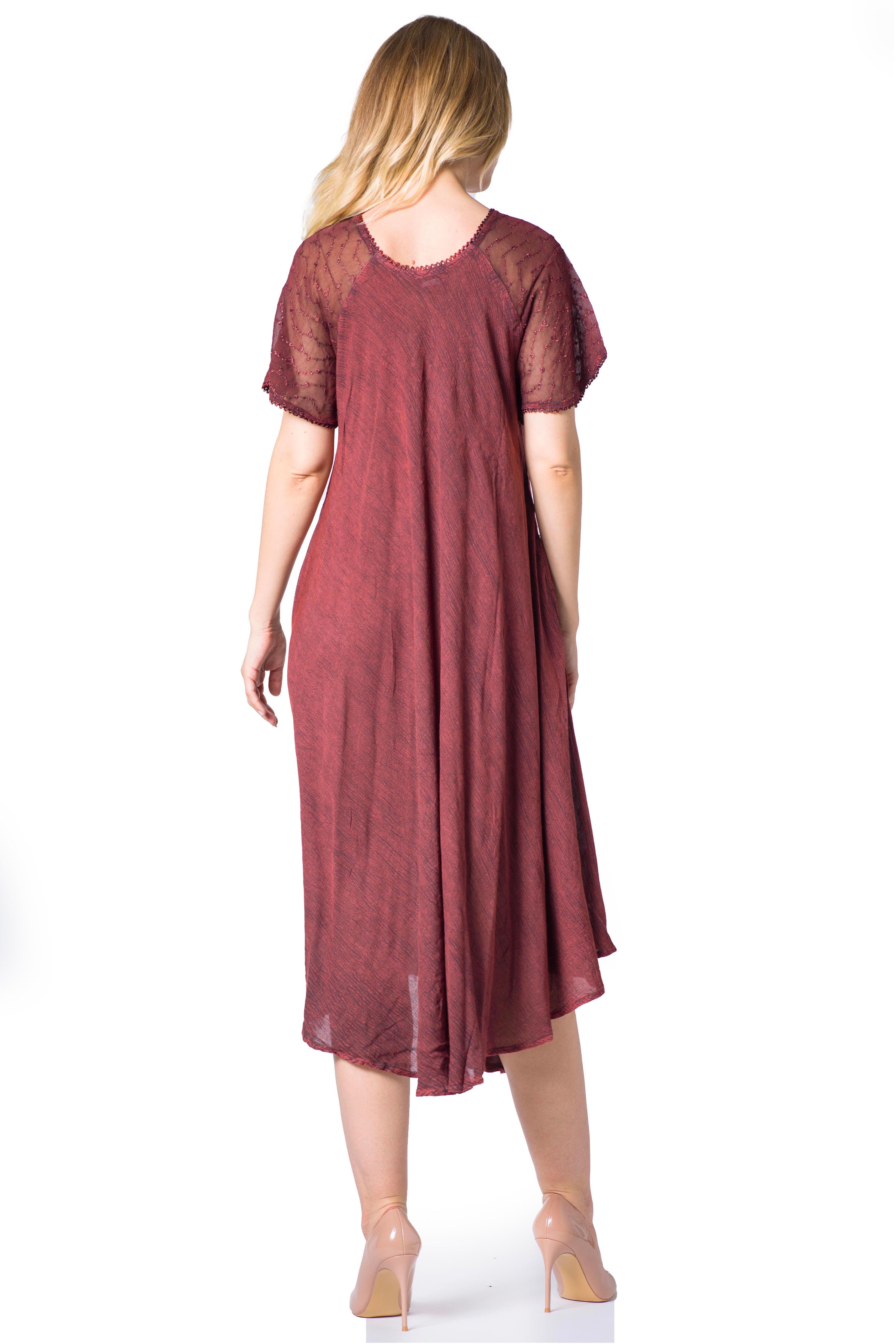 Woman wearing a burgundy dress on a white background