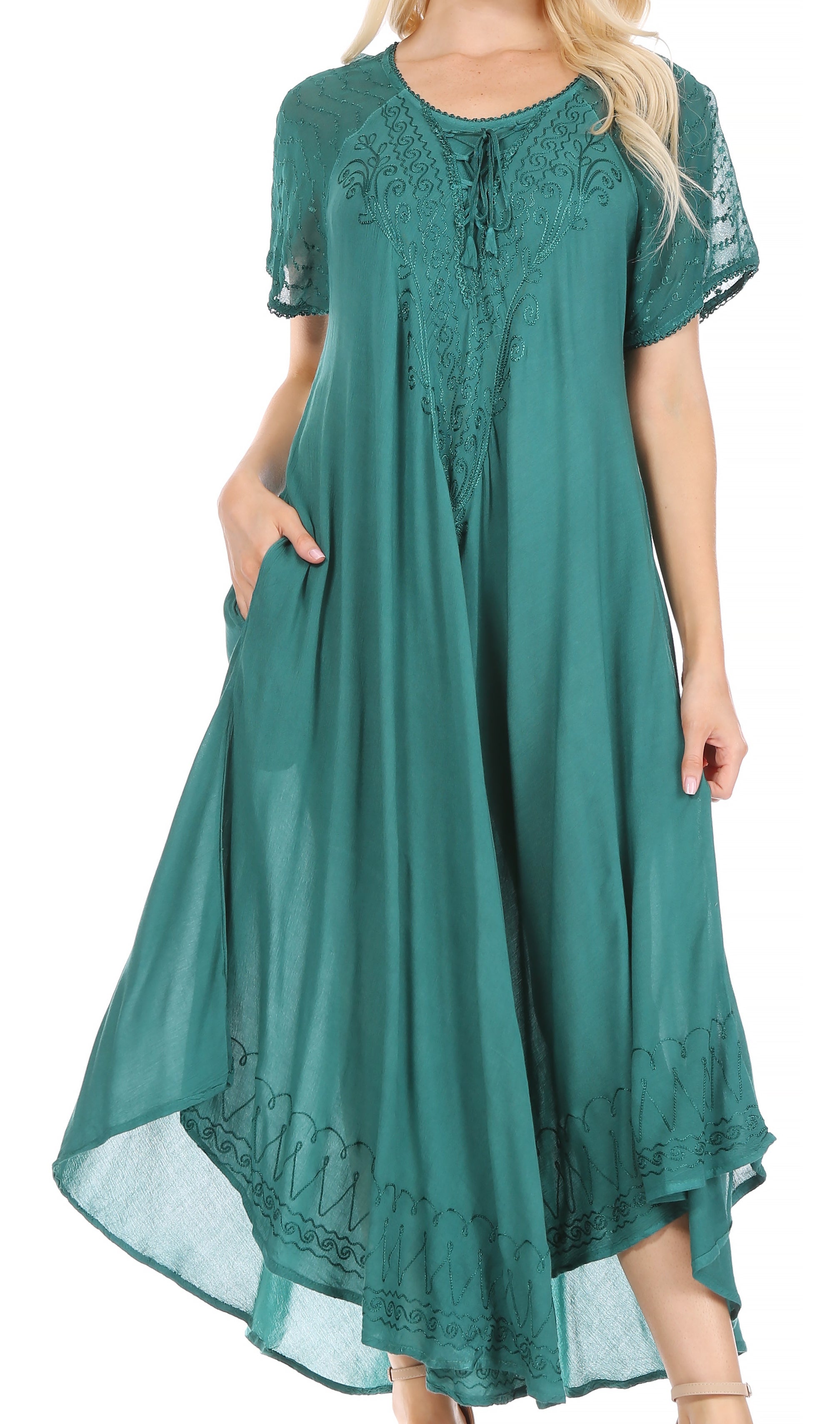 Teal dress with lace details on a white background