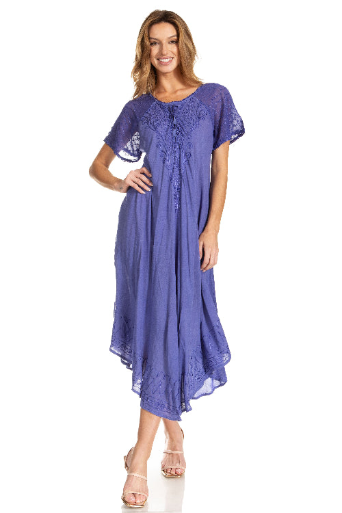 Woman wearing a purple dress with lace details on a white background