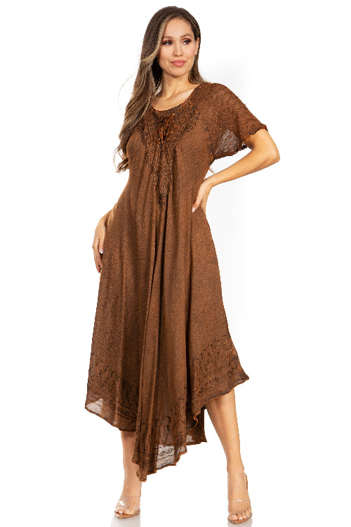 Woman wearing a brown dress with lace details on a white background