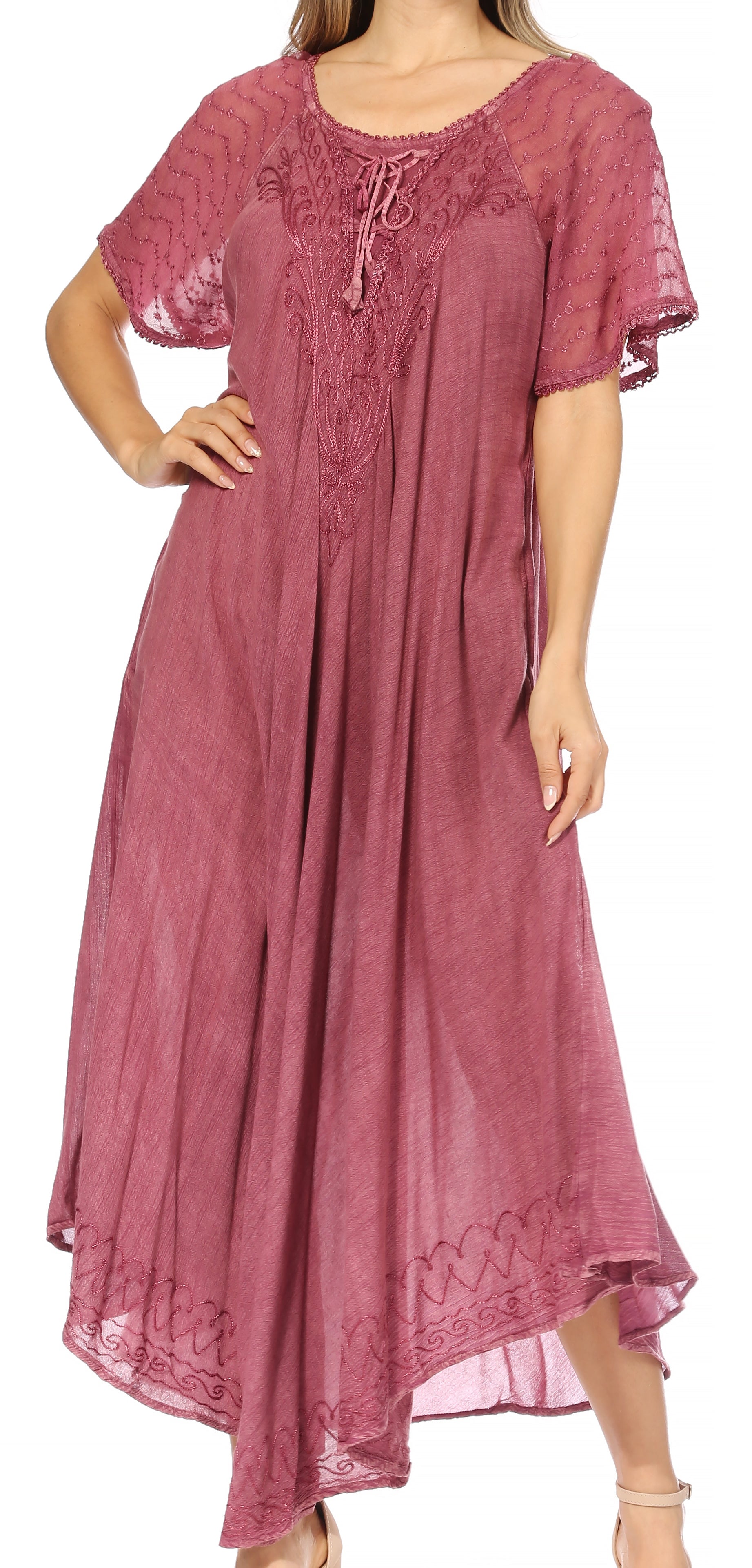 Pink lace dress worn by a model on a white background