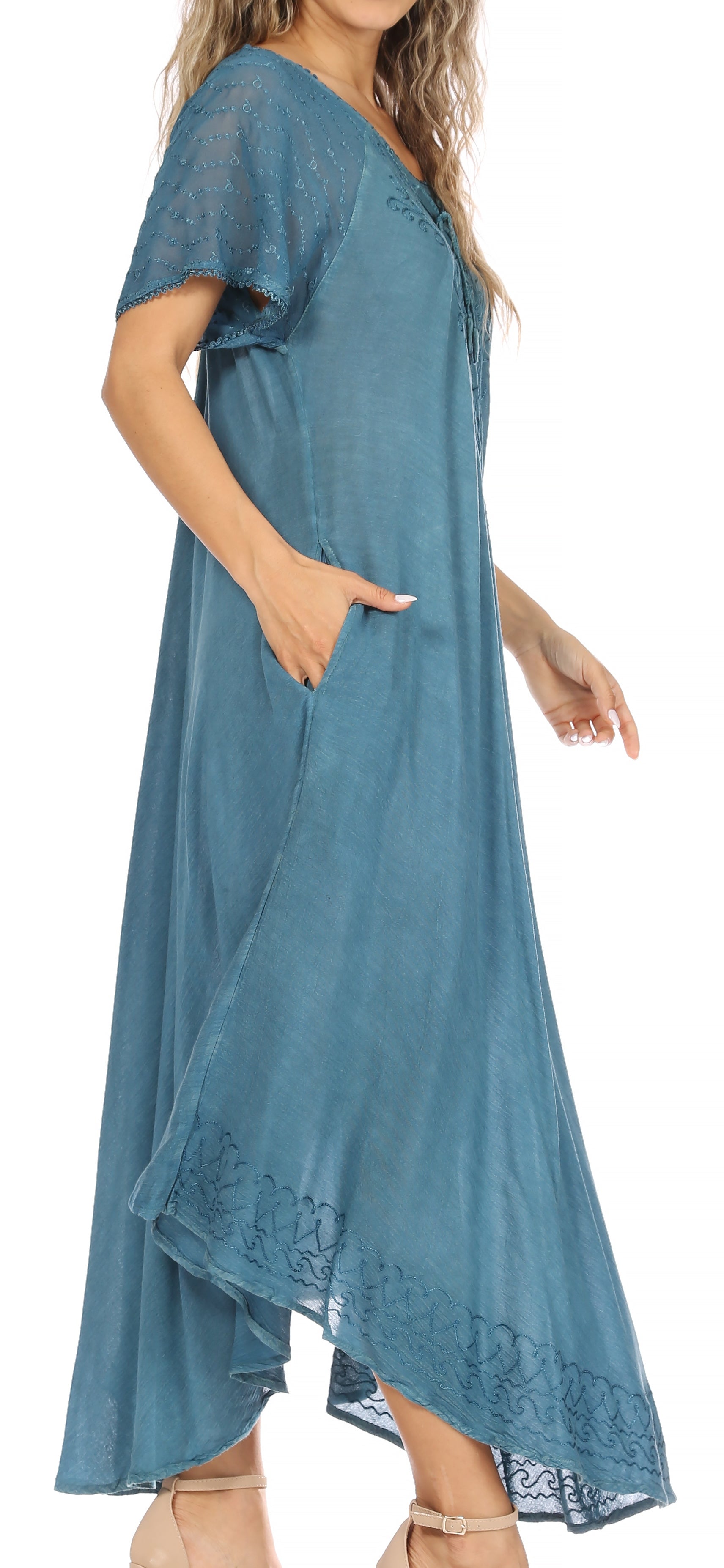 Blue dress with lace details on a white background