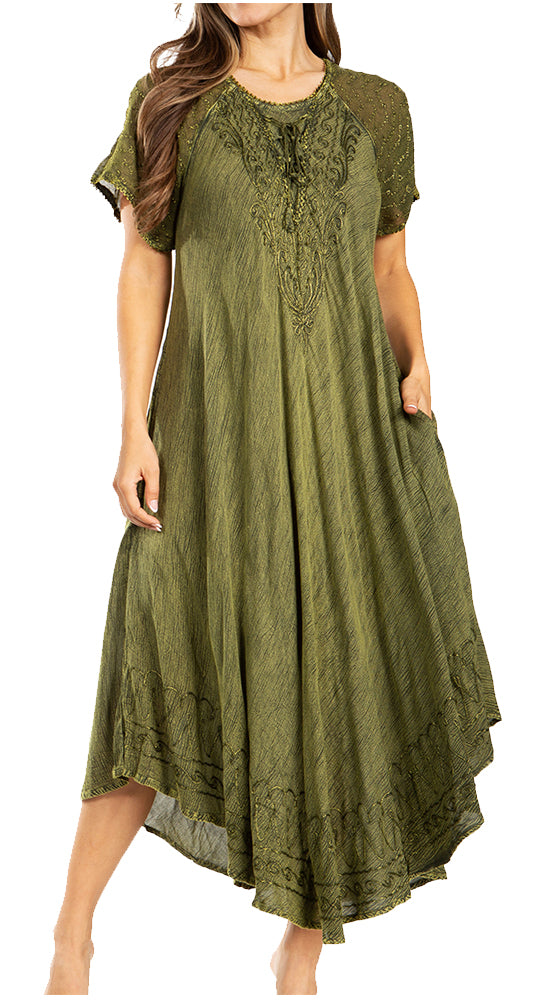 Woman wearing an olive green dress with lace details on a white background