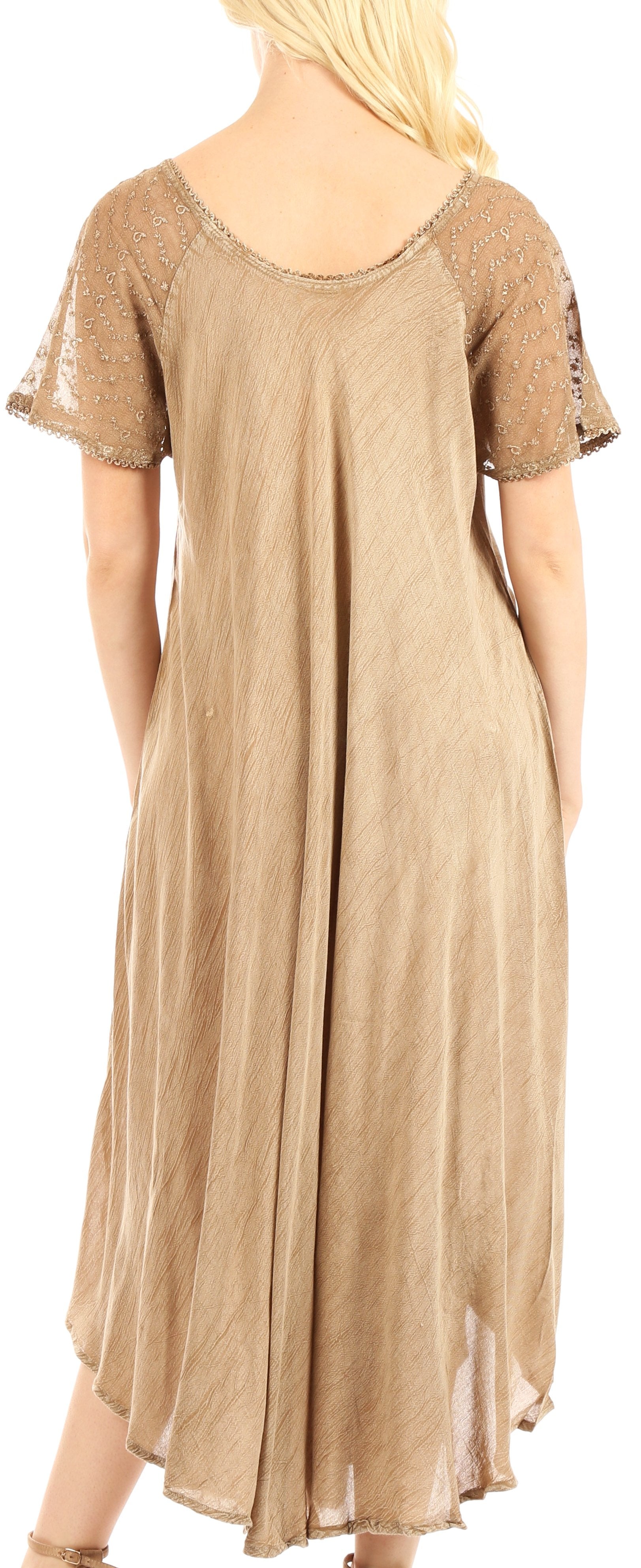 Beige dress with lace sleeves worn by a model