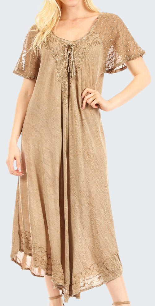 Beige lace dress worn by a model on a white background