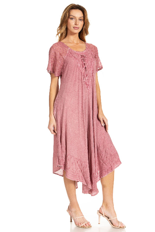 Woman wearing a pink dress on a white background