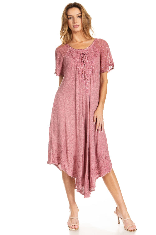 Woman wearing a pink dress on a white background