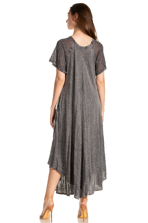 Woman wearing a gray dress on a white background