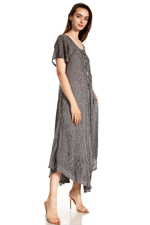Woman wearing a gray dress on a white background