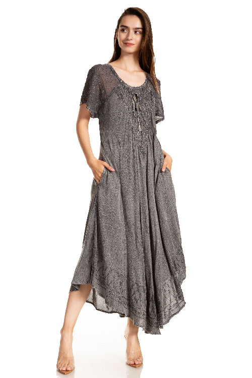 Woman wearing a gray dress on a white background