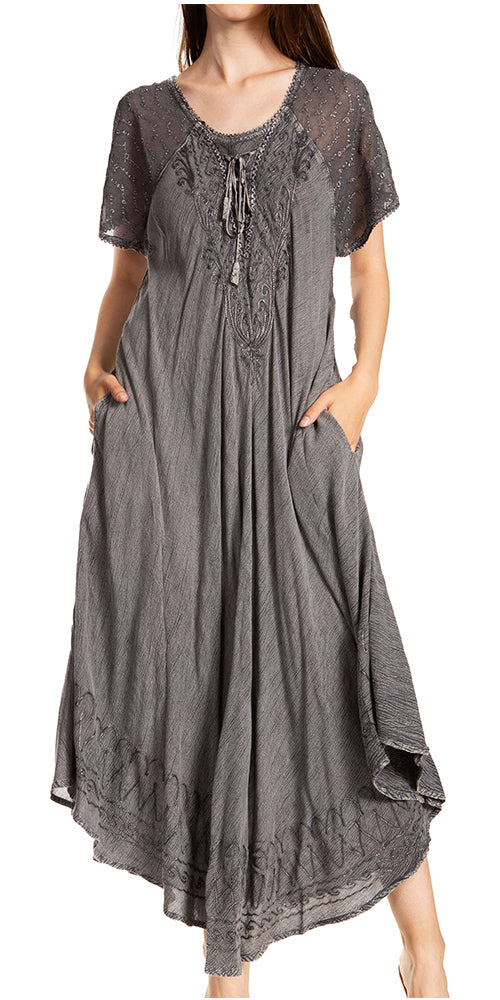 Long gray dress with lace details on a white background