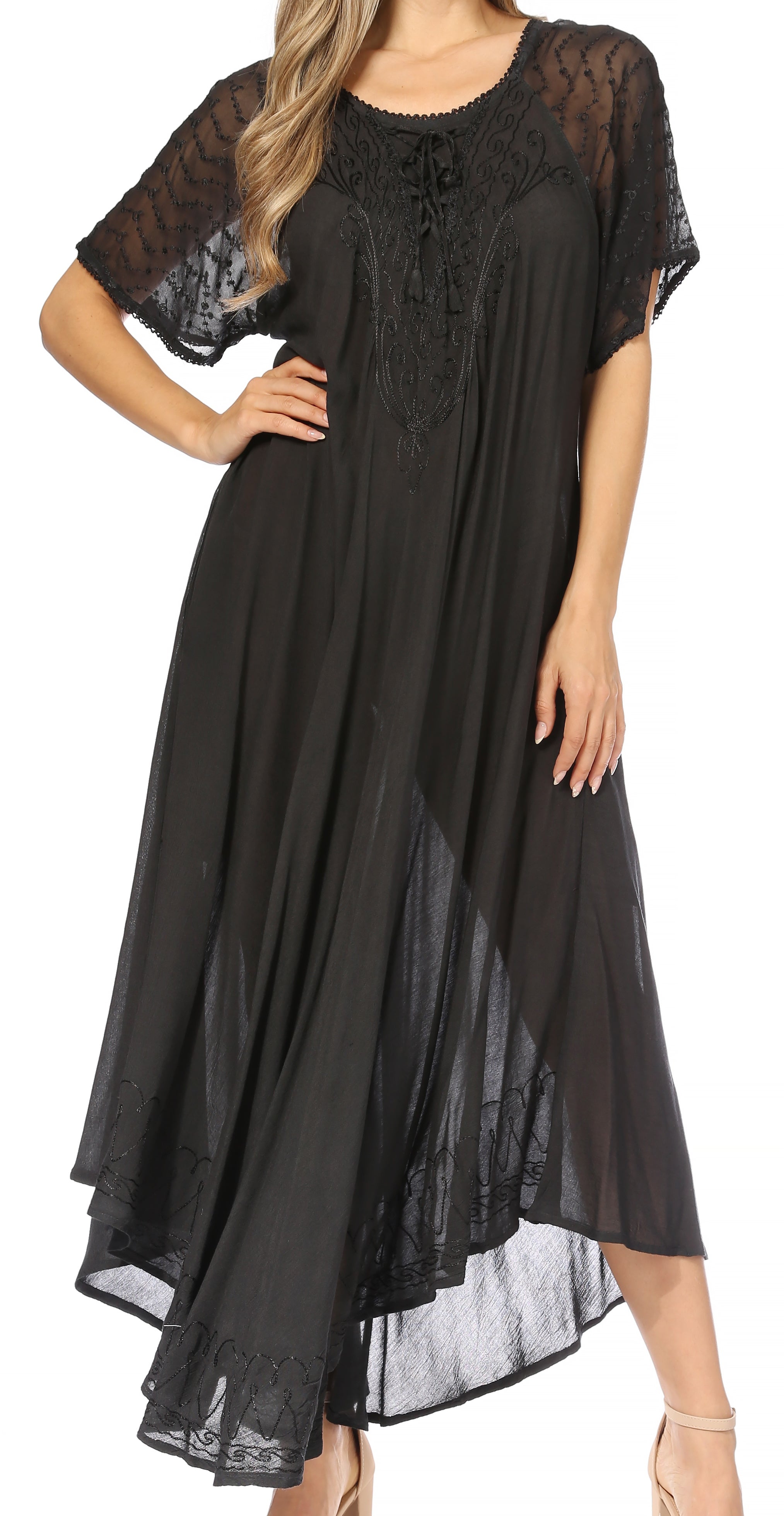 Black lace dress worn by a model on a white background