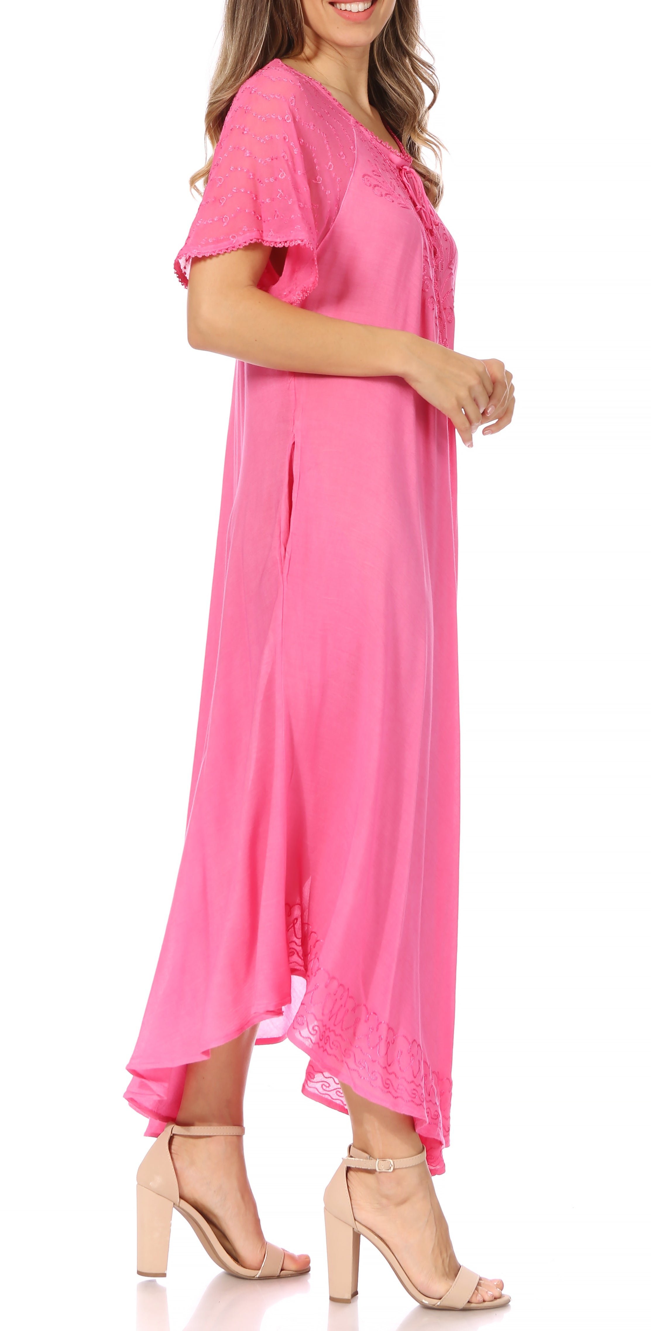 Woman wearing a pink dress on a white background