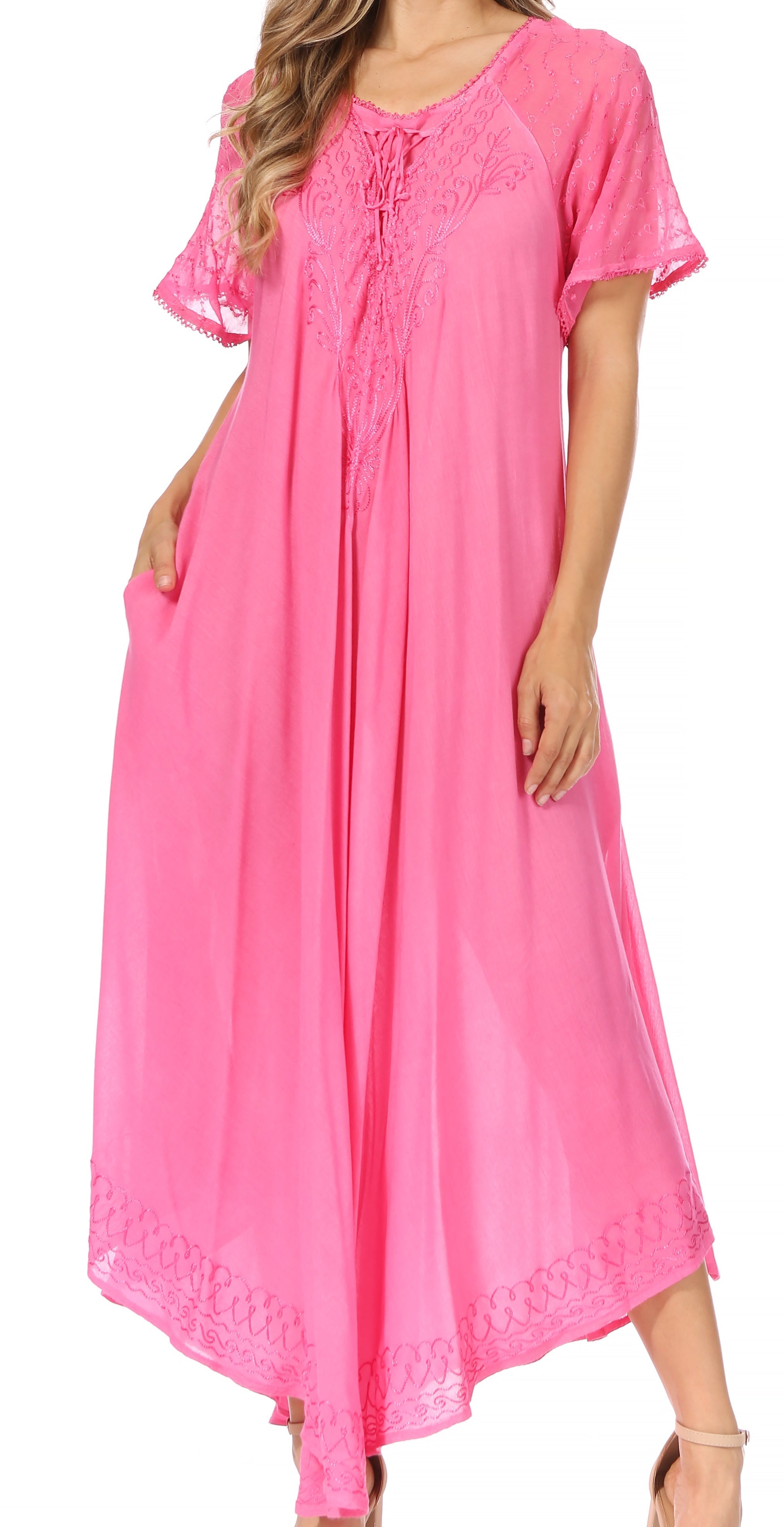 Pink dress with lace details on a white background