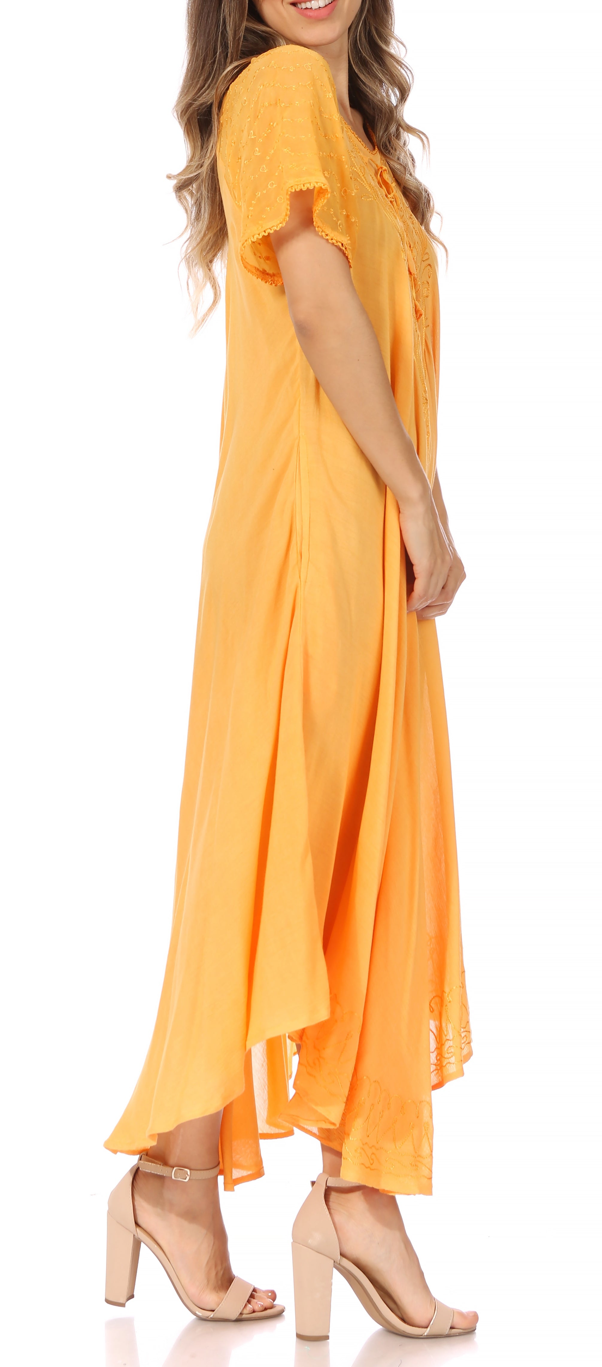 Orange dress worn by a model on a white background