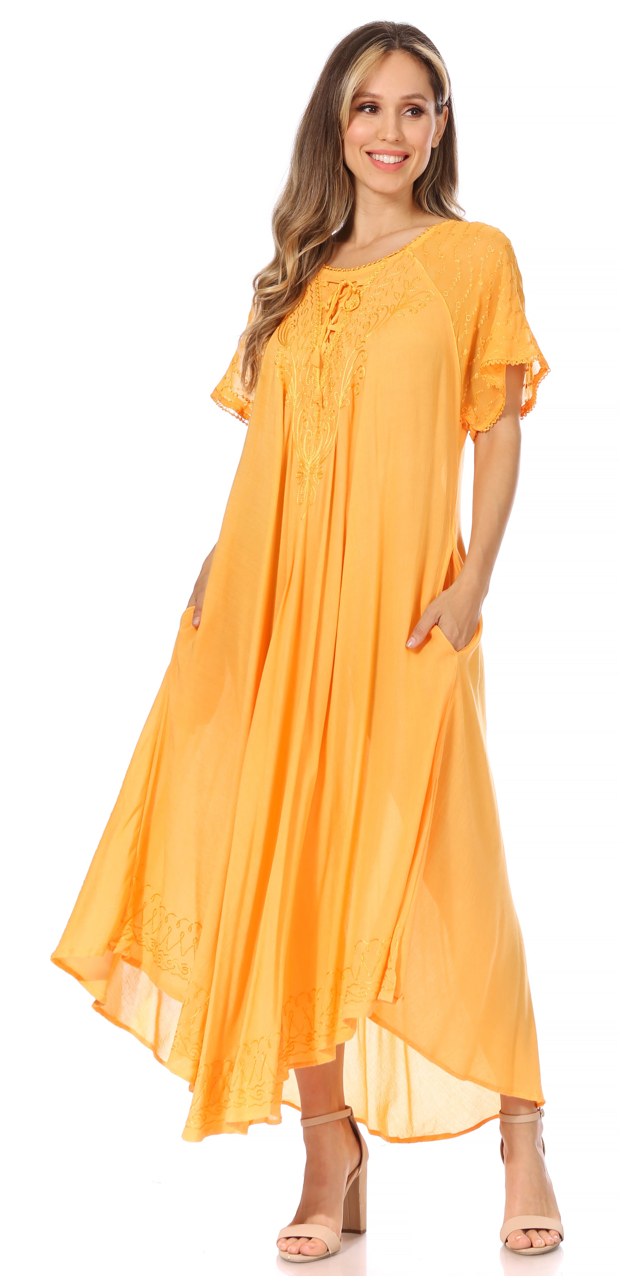 Woman wearing a bright orange dress on a white background