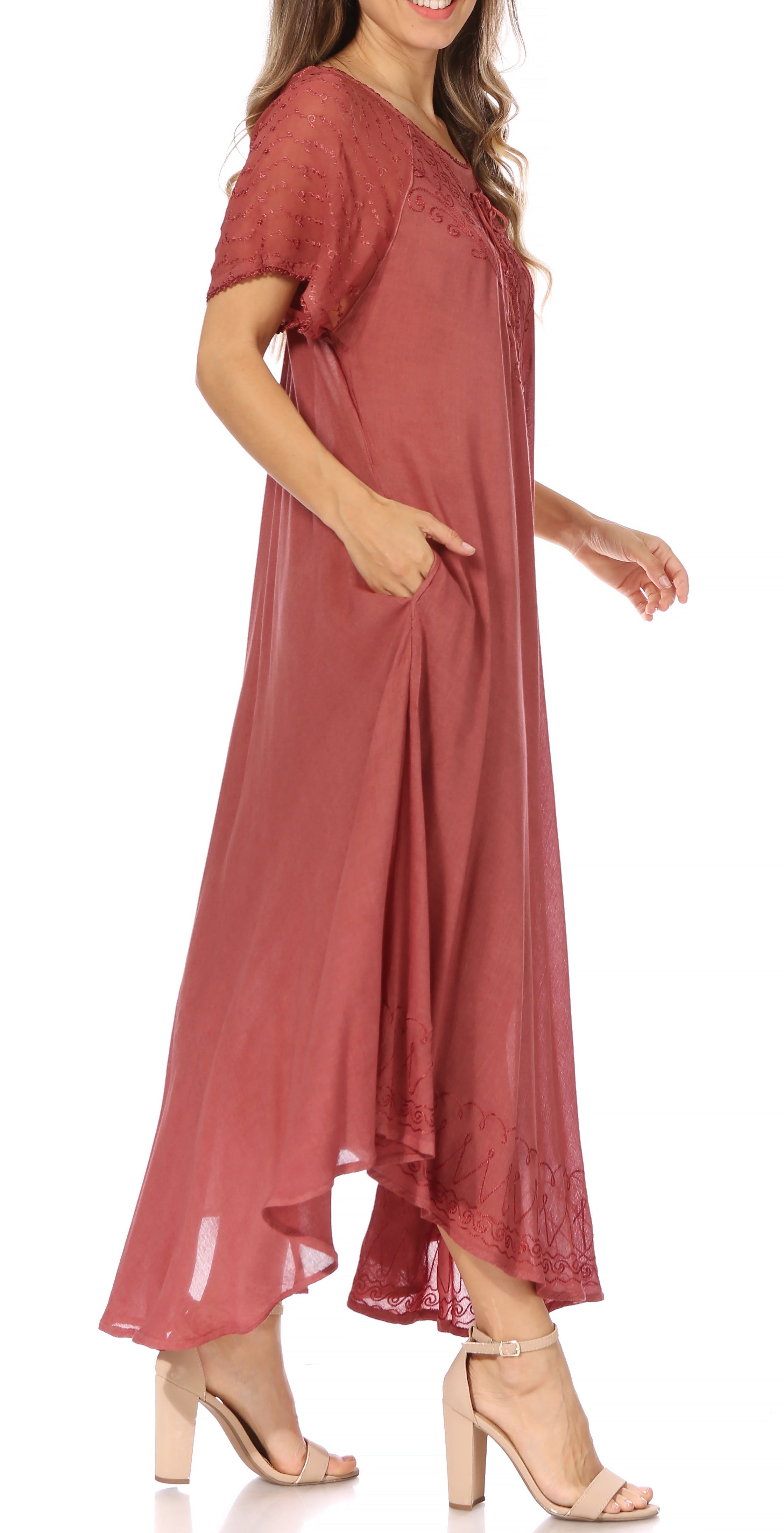 Red dress worn by a model on a white background