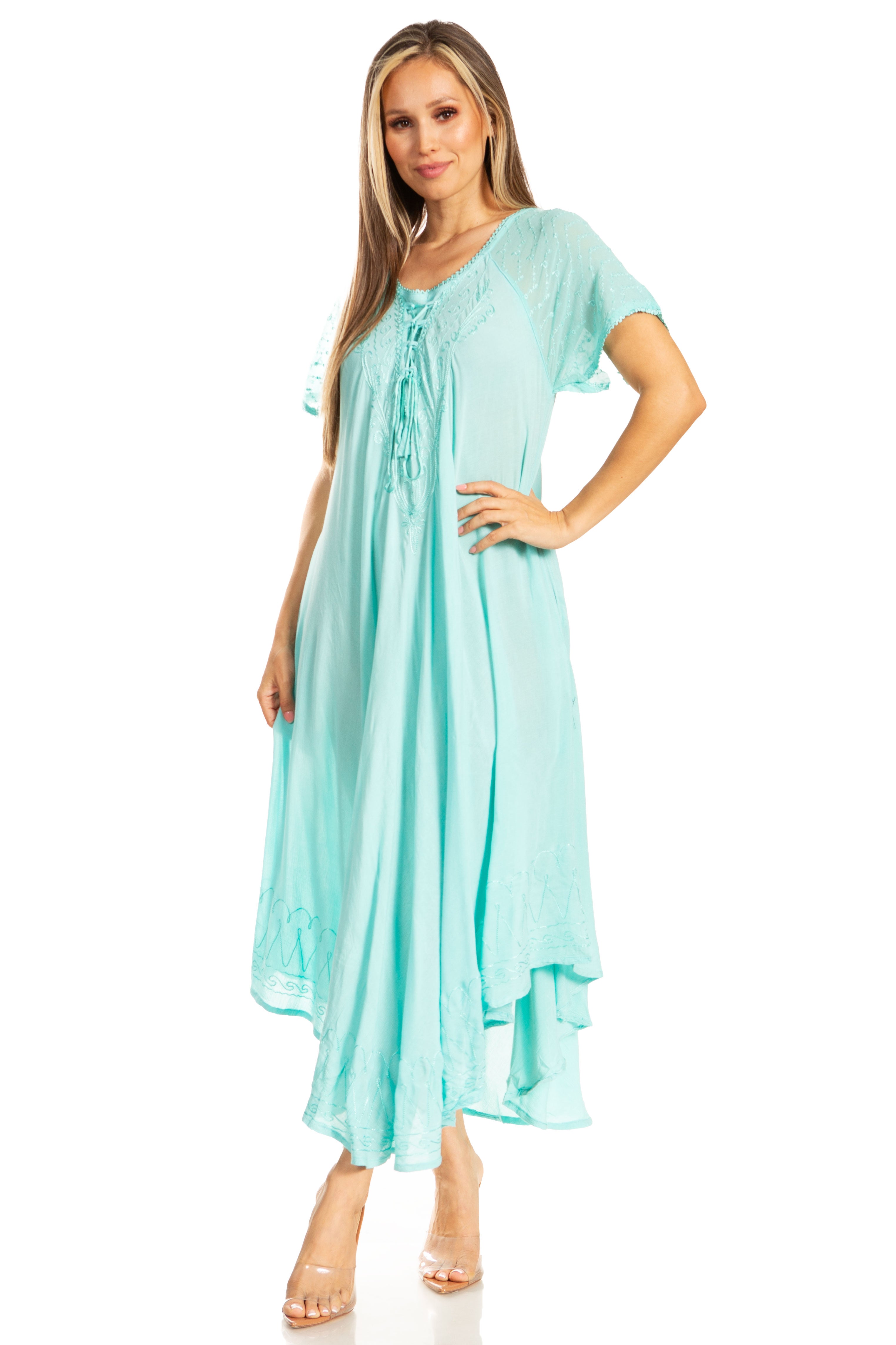 Woman wearing a light blue dress on a white background