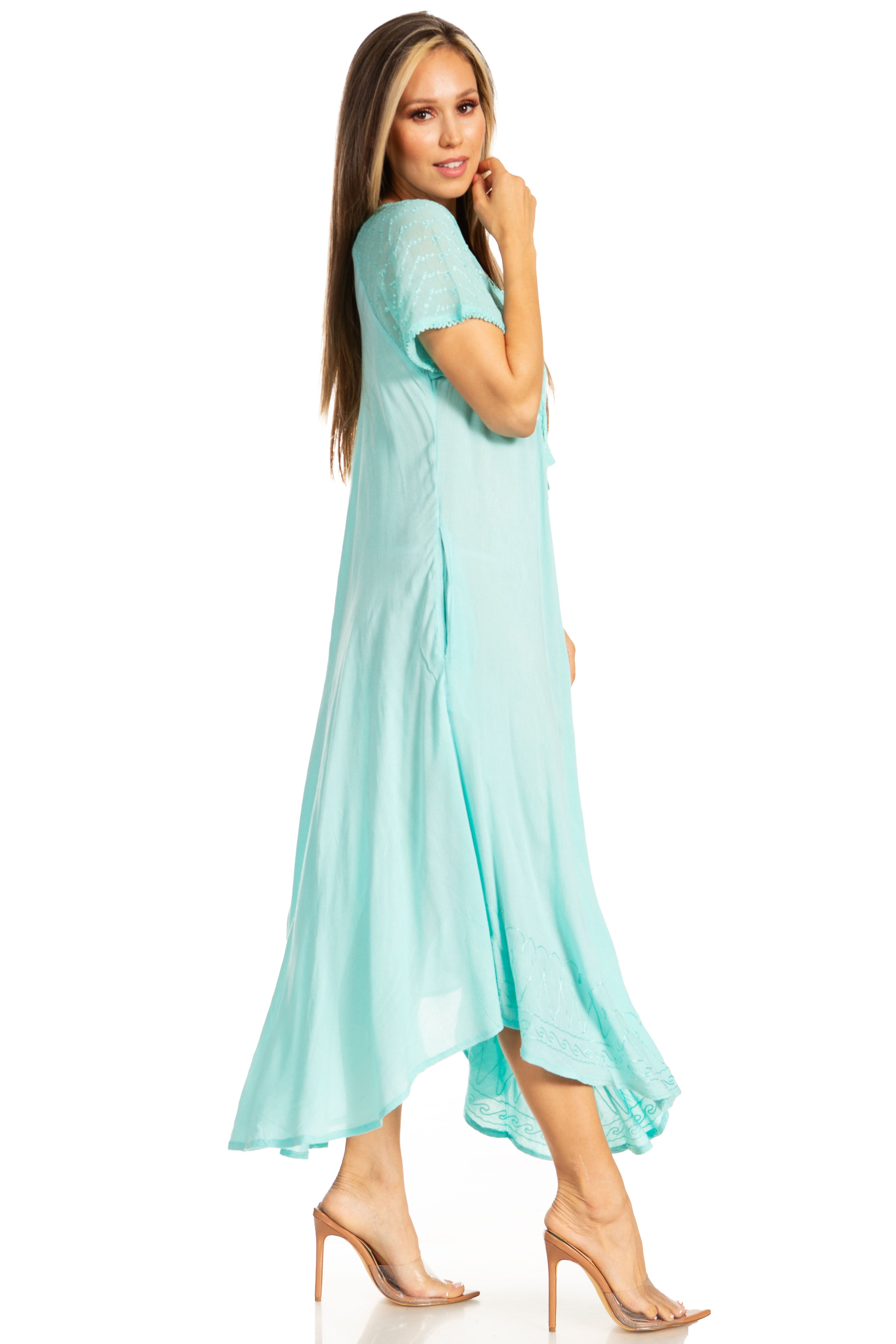 Woman wearing a light blue dress on a white background
