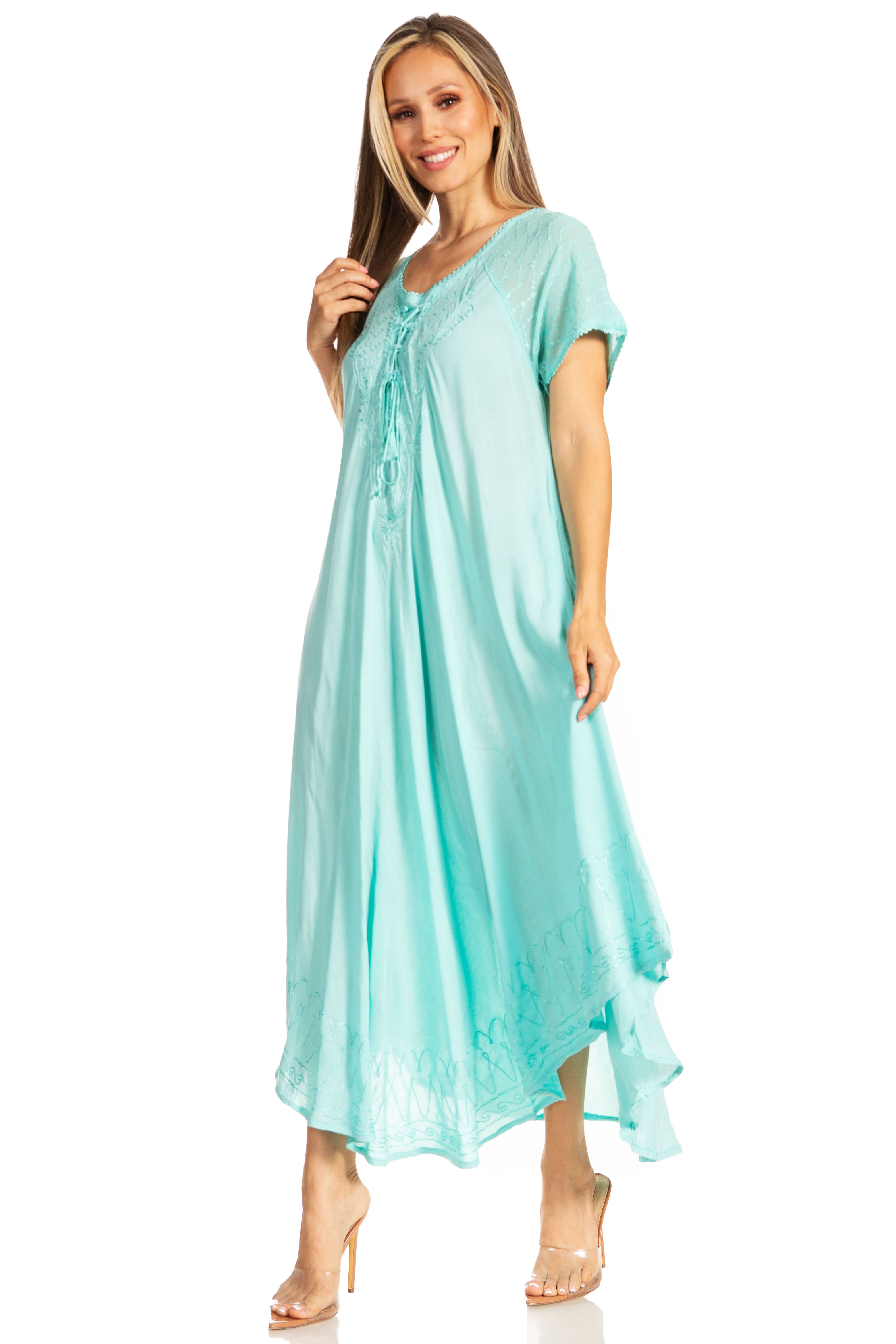 Woman wearing a light blue dress on a white background