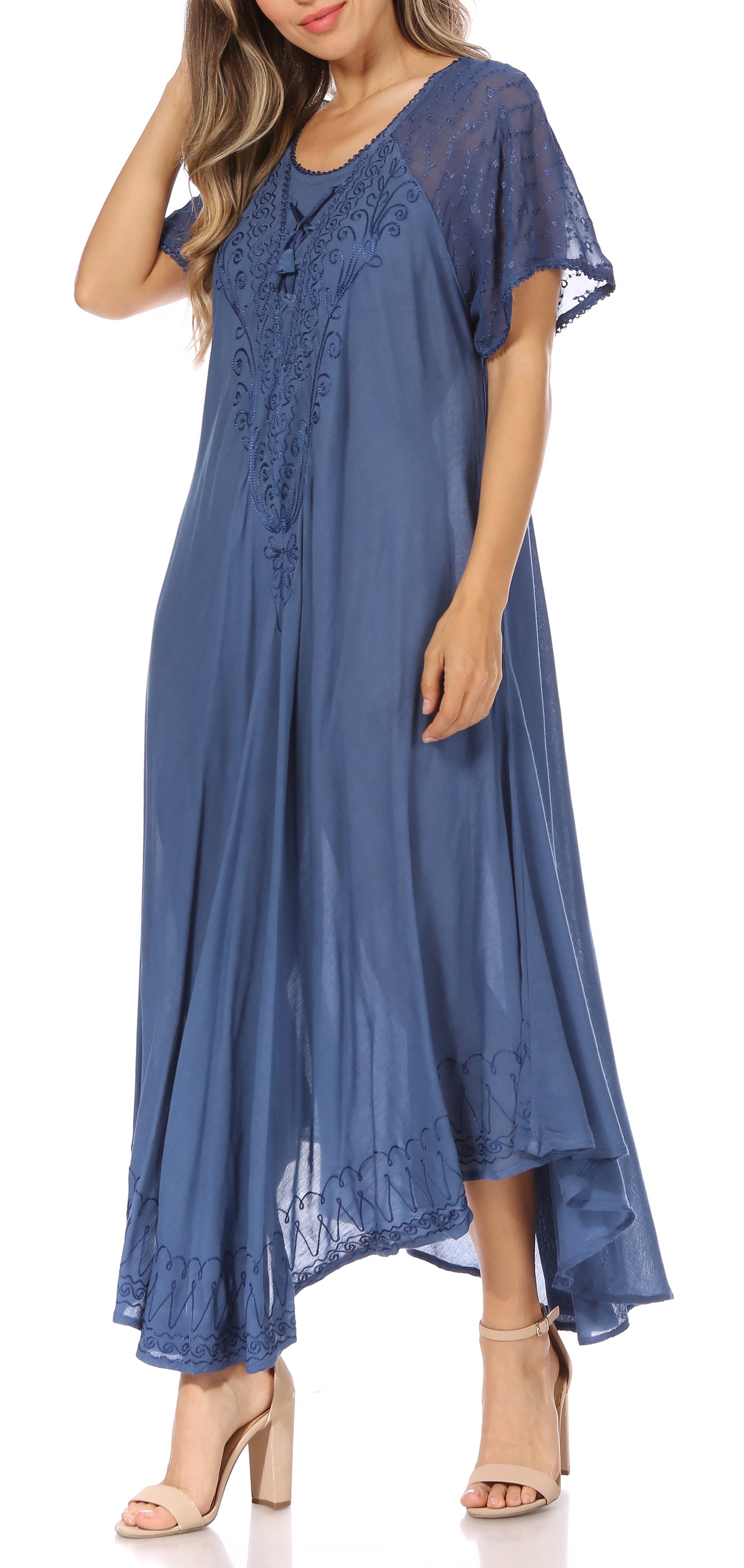 Blue dress with lace details on a white background