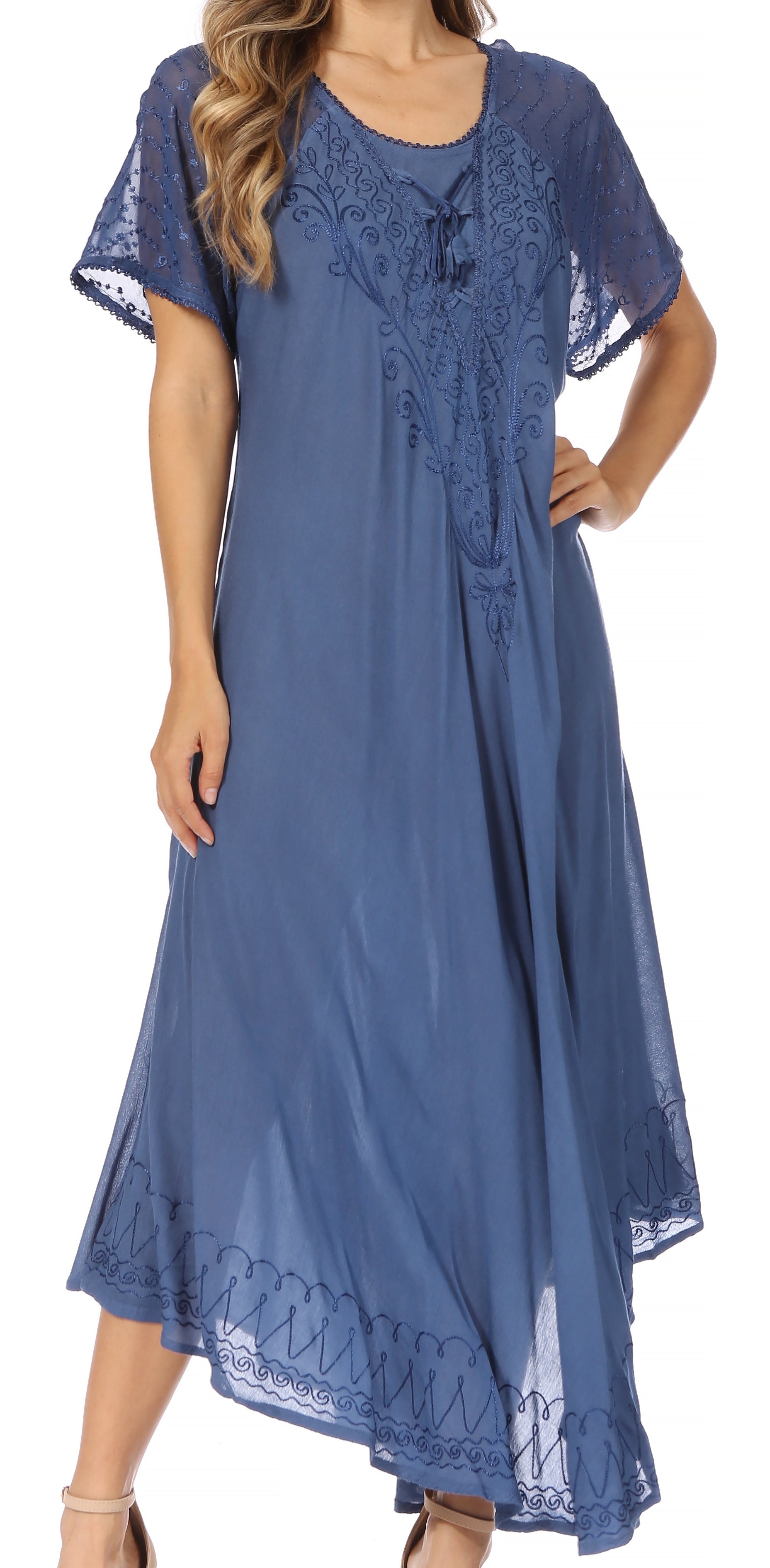 Woman wearing a blue lace dress on a white background
