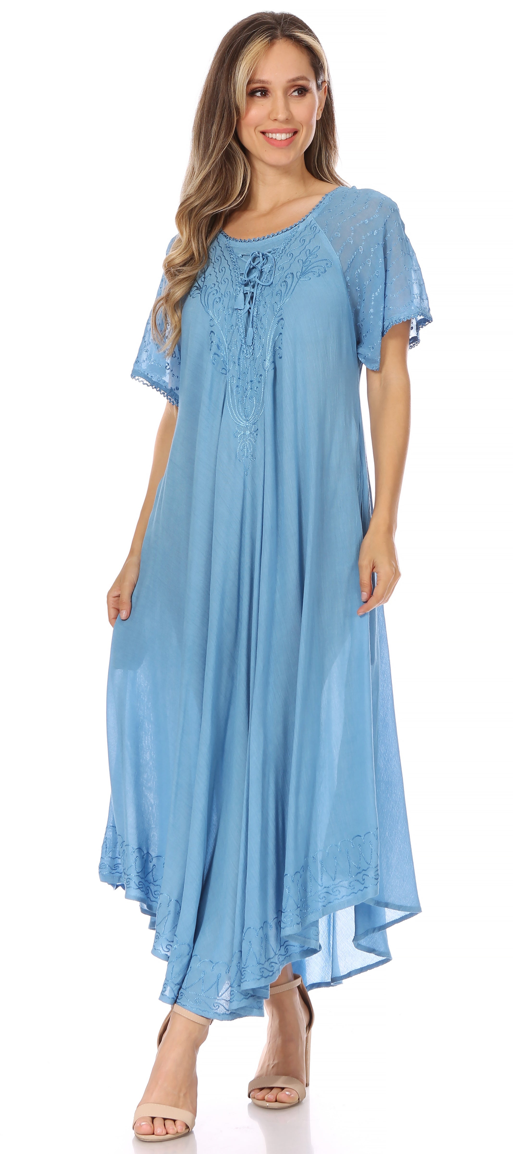 Woman wearing a light blue dress on a white background