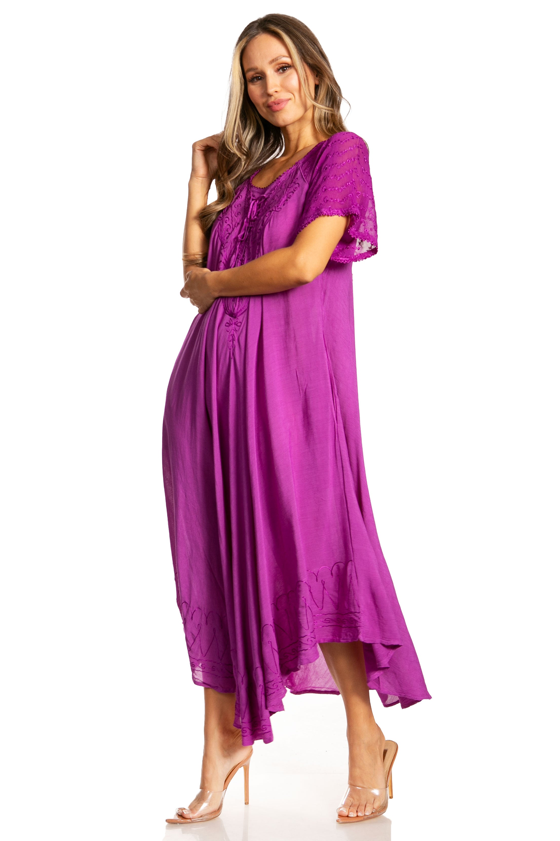 Woman wearing a purple dress on a white background