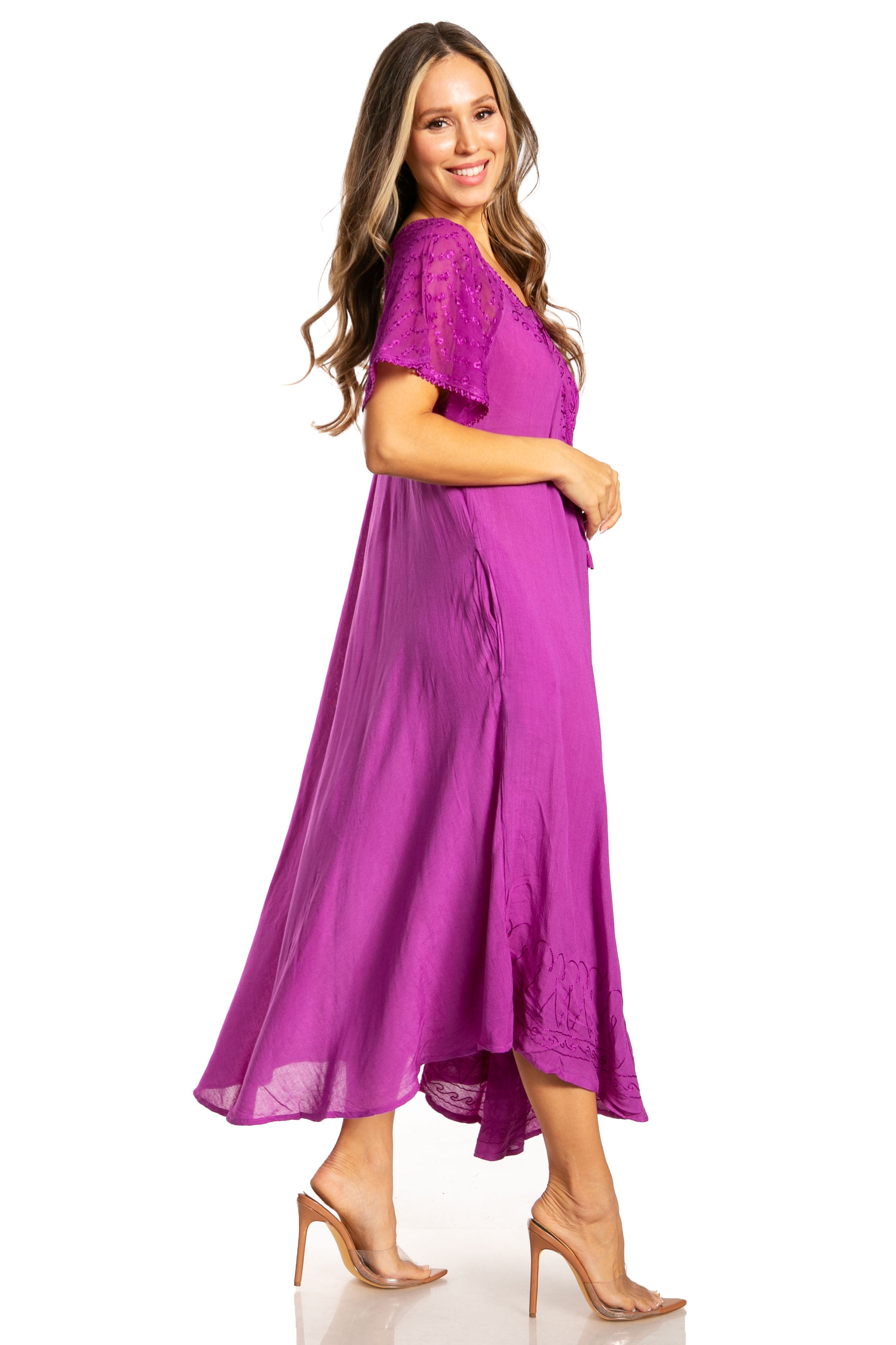 Woman wearing a purple dress on a white background